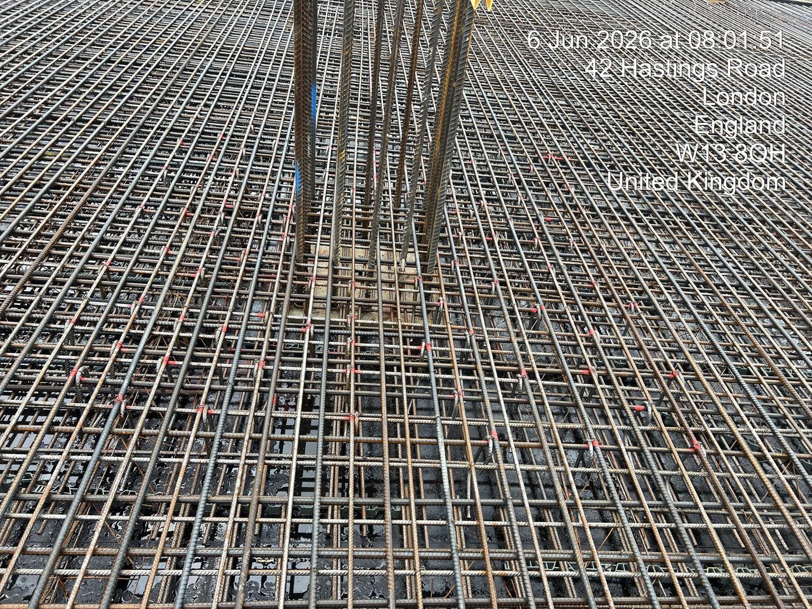 Rebar mat to a suspended slab with the city skyline behind