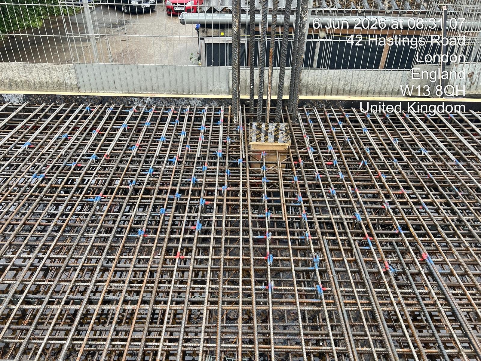Reinforcement mat to a deck with the city skyline behind